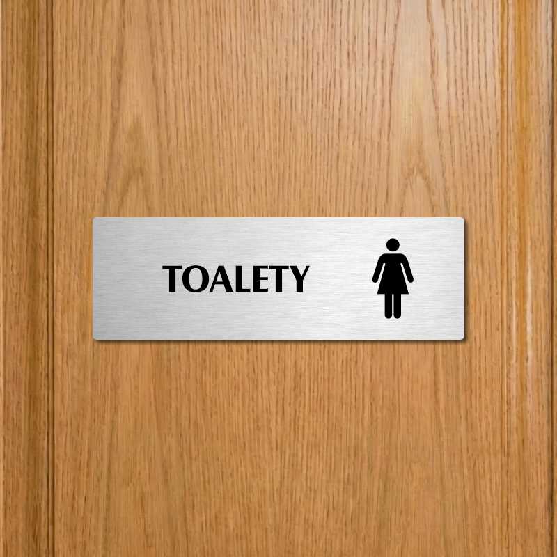 Toalety ženy, 200x66mm, zlatá popiska s imitacemi šroubků